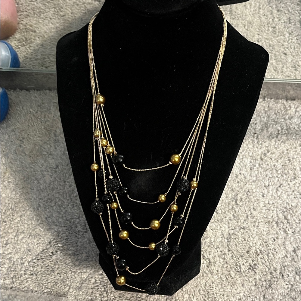 NWT Dillard’s Chic Multi-Layer Gold and Black Necklace.